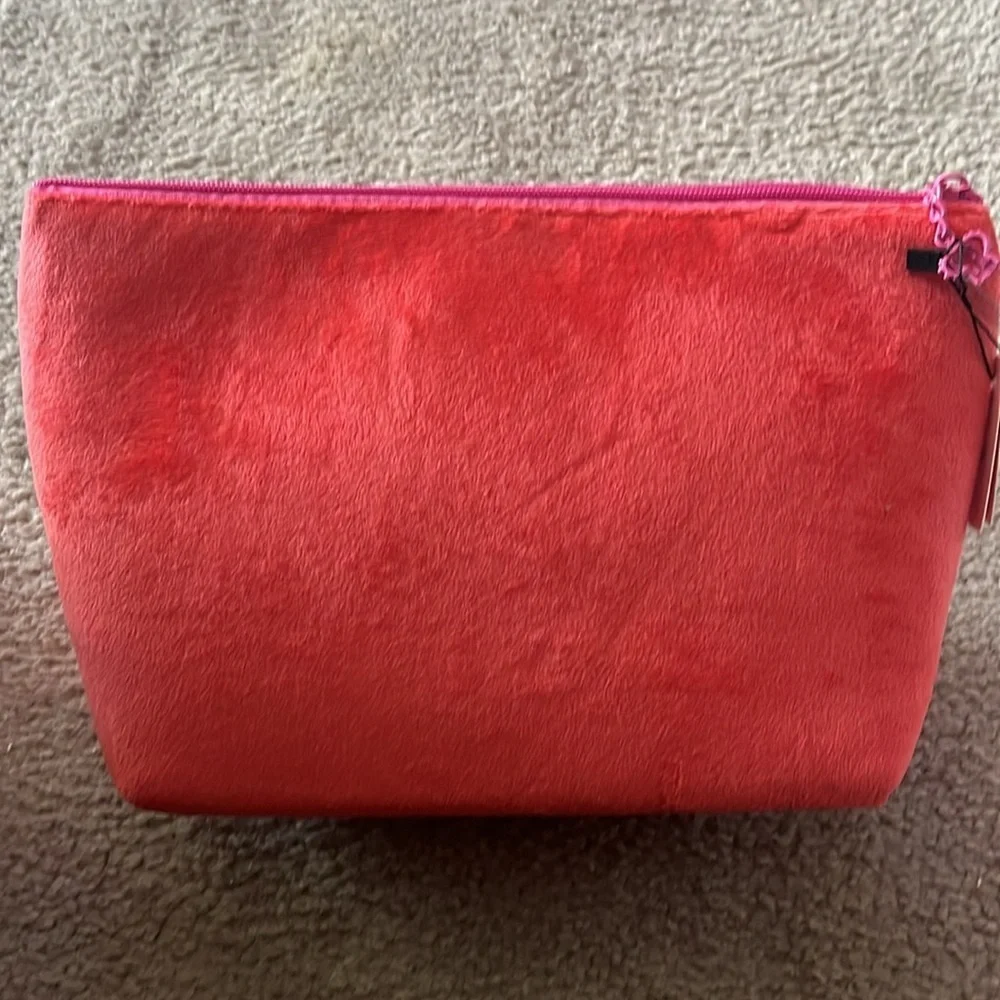 Juicy Couture Pink Cosmetic Bag and Toiletry Bottle